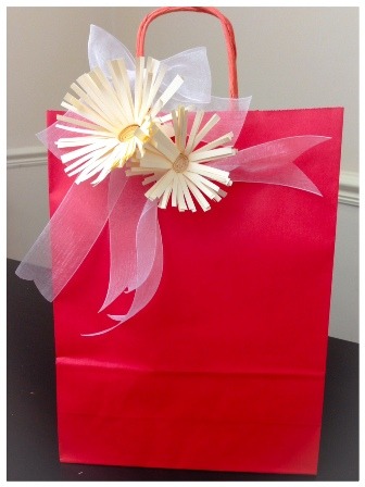 Make a paper flower embellishment for your gift bag