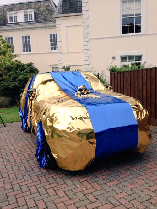 gift-wrapping-a-range-rover-for-mega-millionaire-lottery-winners8