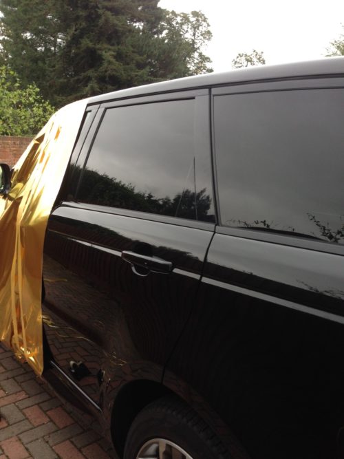 gift-wrapping-a-range-rover-for-mega-millionaire-lottery-winners