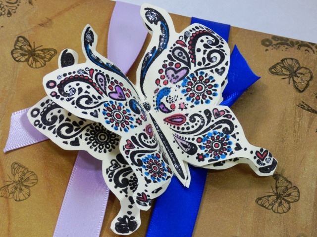 How to make a butterfly embellishment for your gift wrapping